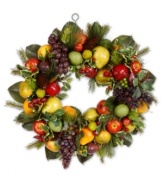 Invigorate your space this holiday season with the vibrant look of this colorful Mixed Fruit holiday wreath. It features a myriad of fruits clustered with pine branches, showcasing one festive harvest.