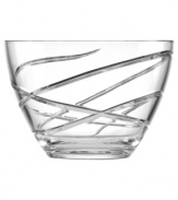 A fanciful cut pattern contrasts the timeless form of this Adorn crystal bowl, featuring the exquisite craftsmanship of Lenox.
