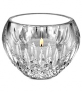 Waterford crystal is made even more radiant with the complex cuts of Monique Lhuillier's Arianne votive holder. A minimalist shape adds to its timeless look and luxurious feel. Use as a rose bowl, too!
