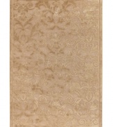 Enhance your decor with the oh-so-luxe look of Couristan's Pave Vintage Damask rug. Woven of a soft blend of viscose, silk and chenille for an unbelievably plush feel and a high-low carved effect, the rug features an elegant damask motif rendered in a luminous pearl shade, adding a touch of vintage-inspired glamour to any space.