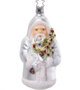 Intricately hand-painted, St. Nicholas comes dressed in silvery white to bring a timeless Christmas ornament to your tree. Mouth-blown in Germany for superior detail and lasting beauty.