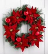 Welcome guests to your home with a wreath of bright red poinsettia and pine. Brilliant red ornaments add to the festive display, accenting a window or door with everlasting cheer.