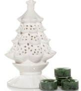 A tree that truly glows, this festive luminary from Yankee Candle features a pure white glaze and delicate pierced accents. Balsam & Cedar tealights suffuse your home with the smell of Christmas.