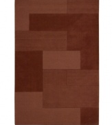 An abstract pattern makes a bold, modern statement upon this inviting Bowery area rug from Calvin Klein. Generously thick wool fibers are hand tufted in India for remarkable strength and detailed design.