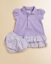 An essential A-line polo dress with pretty puffed sleeves and a ruffled skirt is rendered in breathable, comfortable cotton mesh.Ribbed polo collarShort puffed sleevesButton frontTiered ruffle hemMatching bloomersCottonMachine washImported Please note: Number of buttons may vary depending on size ordered. 