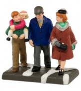 Reunited for the holiday, this beautiful family takes a stroll to see the city up in lights. An heartwarming figurine from Department 56.