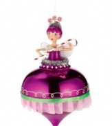 An enchanting holiday awaits with the Nutcracker's Sugar Plum Fairy. A candy cane wand, lollypop accessories and magenta tutu are a soon-to-be sweet spot on your tree. From Department 56.
