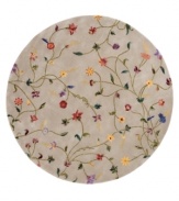 A garden of earthly delights. The Julian Collection sets new standards of quality and clarity for hand-tuffed, hand-carved carpets. A veritable rainbow of flowers and vines set against a soft gold ground. Woven from luxurious 100% premium wool pile rivaling the finest hand-knotted rugs for texture and opulence. Luster-washed for added sheen.