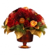 Introduce a colorful, festive accent to your table or mantel with this holiday centerpiece from Winward. Offering several blossoms in a warm colorway, it is sure to liven up the wintry months with beauty.