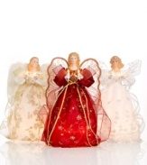 Spirits of the season. Clasping two bright lights, this beautiful tree topper presides over your annual holiday gathering in red and gold or pure white, all with the serenity and grace of an angel.