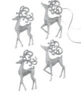 Reindeer a-leaping. Four silver reindeer bound through your tree with a coat of glitter that'll shine bright from any bough.