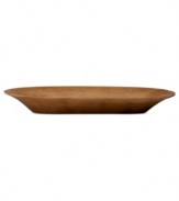 Carved by hand, this mango wood tray epitomizes the effortless sophistication of Donna Karan Lenox. Set the low Sculpted vase inside for striking contrast.