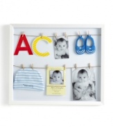 Get hung up on your little one's adorable beginnings with an Umbra picture frame that doubles as a shadowbox. Two lines and a dozen clothespins mean you can give more than a snapshot into his first years.
