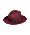 Top off your boho-inspired ensemble with this rich-hued dandyish wool fedora from Emilio Pucci - Wide brim, grosgrain band with gold-tone detail - Pair with a menswear inspired look or a bohemian maxi skirt and blouse