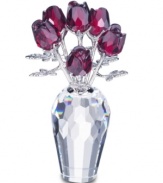 Add a touch of romance to your home with the Swarovski Red Roses. Seven ruby-red roses, crafted of sparkling Swarovski crystal with rhodium stems are set in a multi-faceted vase. 2-5/8 H x 1-5/8 D.