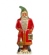 Santa Claus hold a miniature version of himself in this whimsical figurine from Vaillancourt. Hand-painted and shaped from a vintage chocolate mold for one-of-a-kind character.