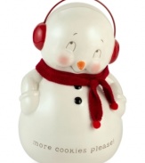 Too sweet, this irresistible snowman cookie jar is just begging for a fresh batch of Christmas cookies. With a red knit scarf, it's a festive treat from Department 56.