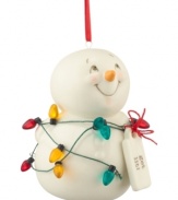 Brighten every day of the season with a snowman ornament that, tangled in red, gold and teal lights, beams with happiness and holiday spirit.