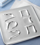 A traditional Passover seder plate, rendered with modern flair. Cast of Nambe alloy featuring Hebrew letters traced in raised lines, creating slopes and shallow grooves to display the holiday's ceremonial foods-with the first letter of each food represented on the plate. The contemporary design infuses this time-honored ritual with striking new elegance.