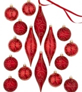 Red balls, drop ornaments and swirls of gold glitter transform your tree into a dazzling spectacle. From Holiday Lane.