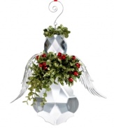 Peace and love. An angel with glistening wings clutches a bouquet of holiday greens in this distinctive kissing ball from Trans Pac.