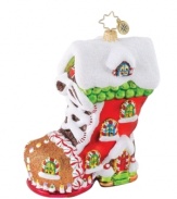 Fashion your tree the way you would a treat with the gingerbread-inspired Sweet Tooth Boot ornament. Christopher Radko decorates from heal to toe in shimmering white frosting and peppermint candies, all in handcrafted glass.