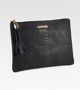 This fashionable clutch is slim enough to slip into your favorite purse, for the ideal everyday pouch.9.5W X 5.5HEmbossed pythonMade in USAFOR PERSONALIZATIONSelect a color and quantity, then scroll down and click on PERSONALIZE & ADD TO BAG to choose and preview your monogramming options. Please allow 1 week for delivery.