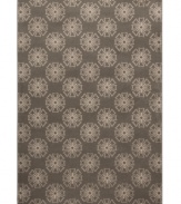 Intriguing star medallions cascade in rich neutrals across this Tribecca area rug, creating a sophisticated, yet casual ground for any contemporary decor. Woven of soft polypropylene for superior stain resistance and durability. (Clearance)