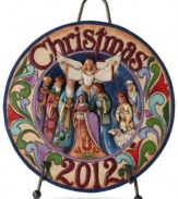 A beautiful, artful reminder to the true meaning of Christmas, this commemorative plate portrays a colorful manger scene with a joyous angel heralding in good tidings for the year to come.