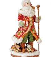 Santa stands alone as the jolliest man on Christmas in Fitz and Floyd's Bountiful Holiday figurine. Rich with detail, from the autumnal pattern in his coat to the animals on the forest floor below, it makes a very merry impression in any holiday setting.