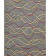 Graphic appeal: an abstract, wavy design flows across the silver field of Nourison's mesmerizing City Limits rug, giving any room a sense of urban-inspired chic. Hand-tufted of polyacrylic fibers, the rug is pleasingly soft, textured and easy to clean.