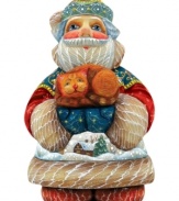 Santa Claus and a friendly feline are the purfect pair in this traditional holiday ornament with fine details and a festive wintry scene hand painted on Santa's coat.