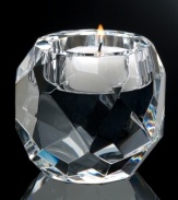 Light up a room with the brilliant Jackie votive by Oleg Cassini. Heavy optic glass shaped by bold geometric cuts sets the mood with dazzling, designer style.