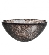 Speckled with black, the Tellus crystal bowl makes a brilliant centerpiece for the dining room or coffee table. Its minimalist shape is perfect for holding hard candies or potpourri but looks simply stunning all on its own.