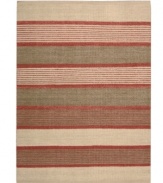 Variegated striping gives way to understated sophistication in the Horizon area rug from Calvin Klein. Generously thick wool fibers are hand tufted in India for remarkable strength and detailed design.