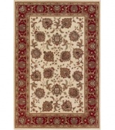 Reminiscent of classic Persian art and culture, this spellbinding rug features a wispy, curvilinear floral pattern in a neutral, burgundy and blue color spectrum. Surrounded by a thin beige border that completes the rug with understated elegance. Easy-care polypropylene ensures durability.