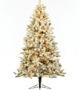 Have a white Christmas indoors and out with this magnificent pre-lit Christmas tree from Kurt Adler. Sturdy branches blanketed in snow that'll never melt and clear lights that are decidedly timeless guarantee you'll always have something to celebrate.