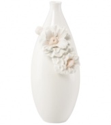 Sculpted camellia blossoms pop with peachy accents against this glossy white Flora vase. A quiet beauty in graceful Lenox porcelain. Qualifies for Rebate