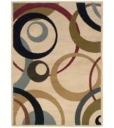 Modern circles overlap in vibrant colors upon smooth cream, allowing for an intriguing design underfoot. Thick, low pile cut presents a smooth, lush ground for a refined finish in any room. (Clearance)