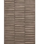 Cascading rows of stripes offer a simple and refined appeal in this Tribecca rug. A lovely addition to any room, this rug is constructed of soft, low pile polypropylene. (Clearance)