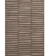 Cascading rows of stripes offer a simple and refined appeal in this Tribecca rug. A lovely addition to any room, this rug is constructed of soft, low pile polypropylene. (Clearance)