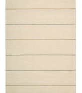 Subtle striping gives way to understated sophistication in the Horizon area rug from Calvin Klein. Generously thick wool fibers are hand tufted in India for remarkable strength and detailed design. Perfect for mixing with any style decor.