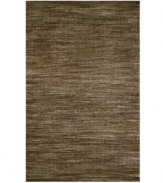 Variegated coloration in subtle striping gives way to modern texture and simple elegance in the Corsica area rug from Liora Manne. Hand-woven in India of pure wool fibers, the Madrid area rug is a comforting, stylish addition to any decor.