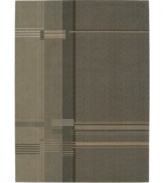 The Calvin Klein Loom Select Rug Collection offers a modern design approach to floor coverings with an emphasis on distinct colors and subtle textures. Woven in plush wool with refined accents of hand carving, these rugs provide a dense and luxurious texture, while a soft patina imbues each carpet with distinct depth and design distinction. Features a series of different sized vertical panels in neutral earthtone colors layered over with three sets of horizontal stripes. The result is a modern design with an abstract feel that will fit easily into any room in your home.