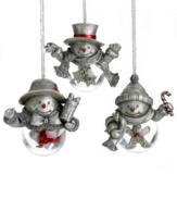 Shake things up. Three friendly snowmen with bellies full of holiday treats are part ornaments, part snow globes and wholly irresistible. With present, snowflake and gingerbread motifs. From Towle.