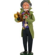 Cuckoo for Christmas, this talented clockmaker peddles his latest creations as last-minute holiday gifts. A beautiful green coat and tuft of holly in his hat make him a welcome sight, with the handcrafted charm of Byers' Choice.
