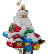 Spirits will soar with Christopher Radko's Jet Set Santa ornament. St. Nick pilots a toy plane outfitted with shiny red wings and handcrafted in Polonaise glass.