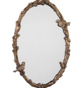 Hand-forged metal frame with an antiqued gold finish depicts small songbirds perched on a vine calling to each other. Whether in the foyer or on any other wall, your eyes will be drawn to the Paza mirror because of its old-fashioned, romantic charm.