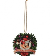 Welcome to the circle of friends! Everyone's favorite Santa stand-in peeks out from a berry-laden wreath to spread Christmas cheer and warmth throughout your home.