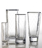 Filled with your favorite fresh blooms, the Larabee Dot cylinder bud vase is the perfect decoration for any tabletop or mantle. Featuring etched polka-dots on clear crystal by kate spade new york. Bud vase shown far left.